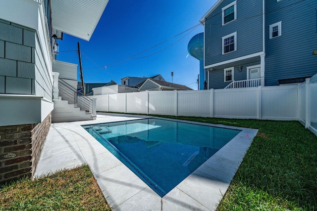 view of pool with a fenced backyard and a fenced in pool