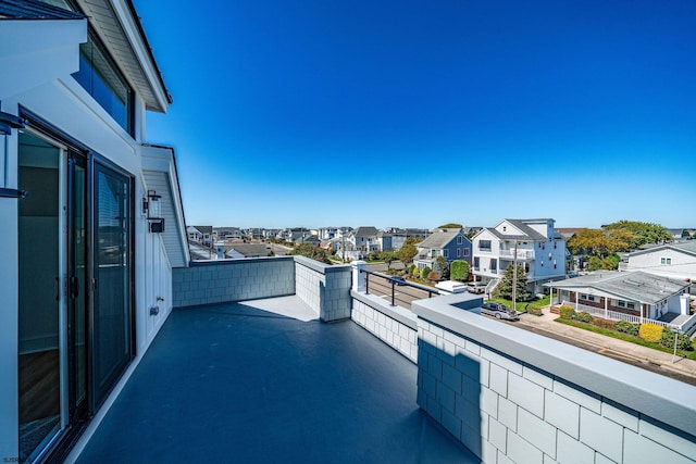 balcony featuring a residential view