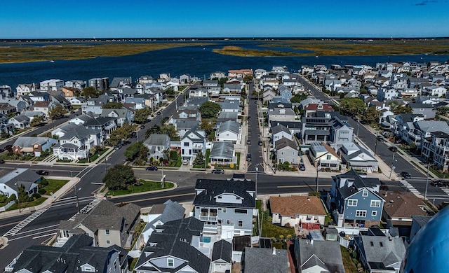 aerial view featuring a water view and a residential view