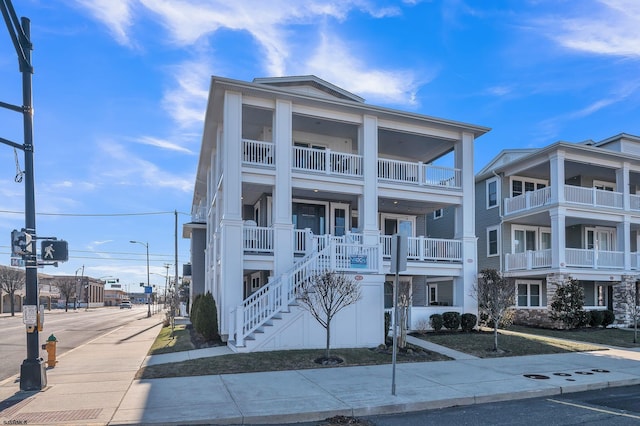 view of front of house featuring stairs