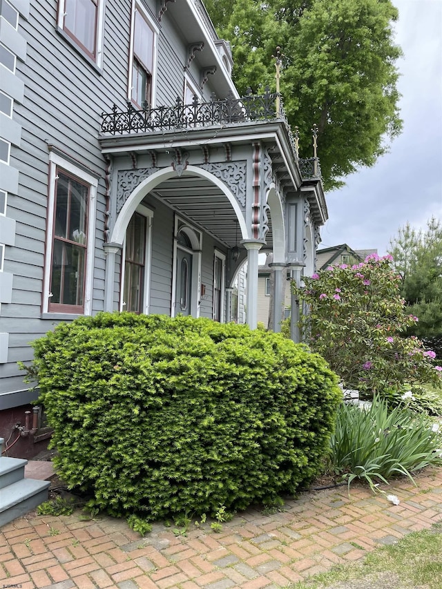 view of property exterior with a balcony