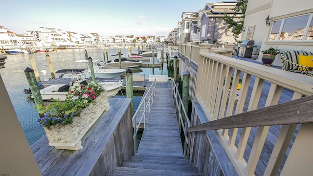 dock area featuring a water view