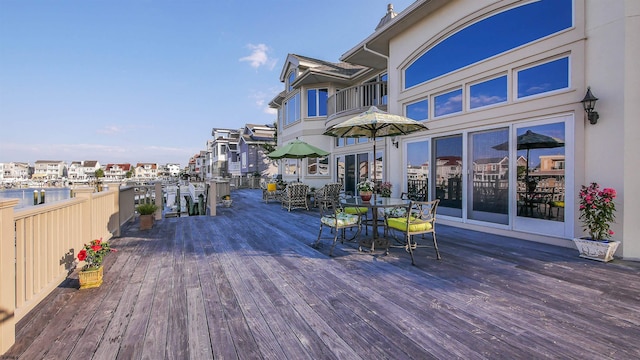 deck featuring outdoor dining area