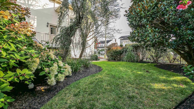 view of yard with fence