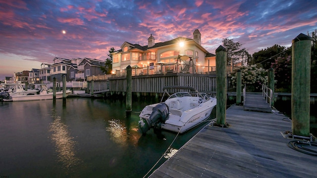 dock area with a water view