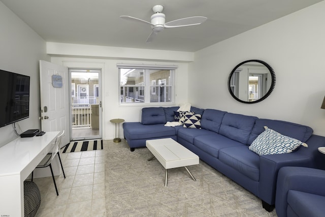 living room with light tile patterned floors and ceiling fan