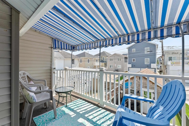 balcony featuring a residential view