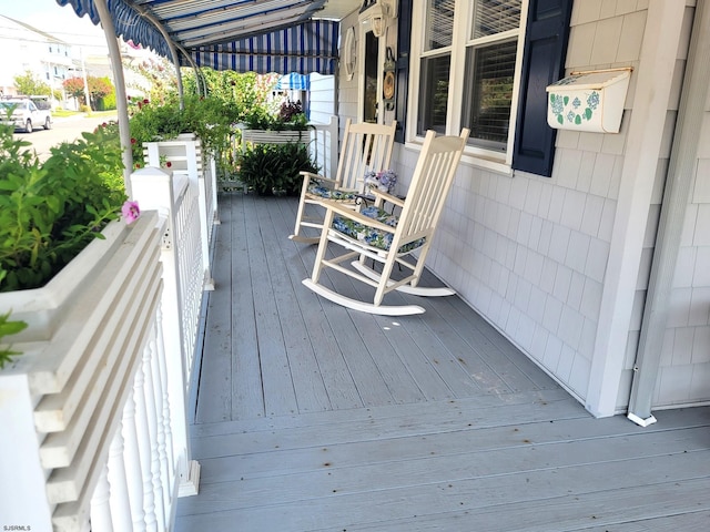 wooden deck with covered porch