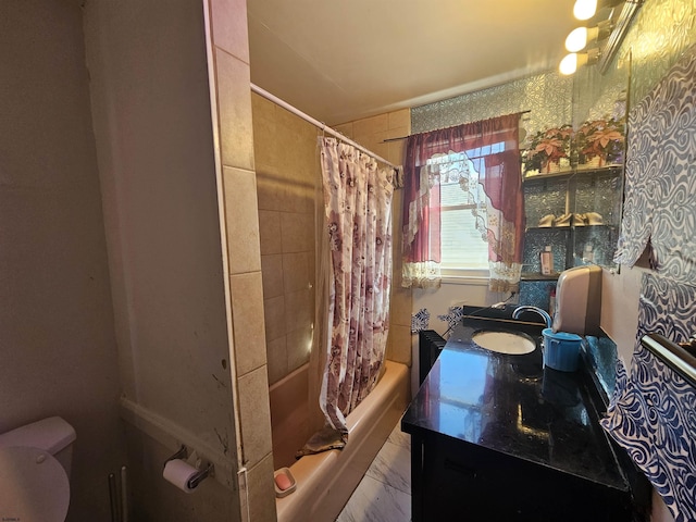 bathroom featuring shower / bath combo, marble finish floor, vanity, and toilet