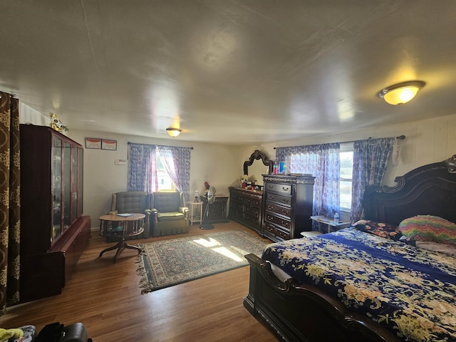 bedroom featuring wood finished floors