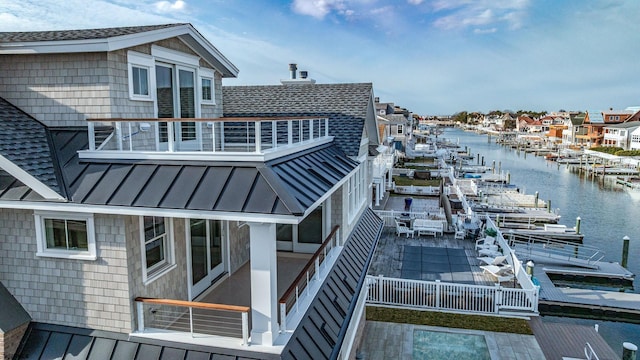 4 Grenada Ln, Ocean City, NJ 08226 - exterior space featuring a water view, a standing seam roof, and metal roof