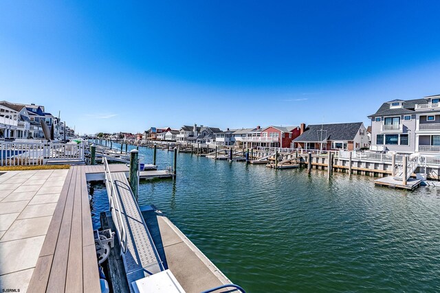 4 Grenada Ln, Ocean City, NJ 08226 - dock area featuring a residential view and a water view