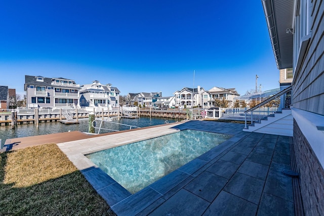 4 Grenada Ln, Ocean City, NJ 08226 - view of pool with a water view, a residential view, a patio, and a boat dock