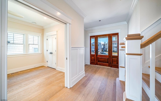 4 Grenada Ln, Ocean City, NJ 08226 - foyer with a wainscoted wall, visible vents, light wood-style floors, stairs, and ornamental molding