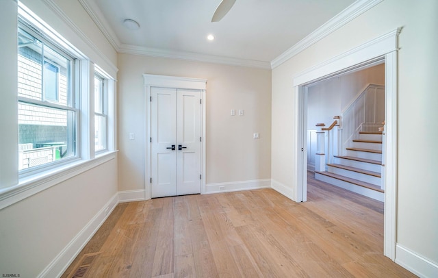 4 Grenada Ln, Ocean City, NJ 08226 - interior space featuring stairway, crown molding, light wood-style flooring, and baseboards