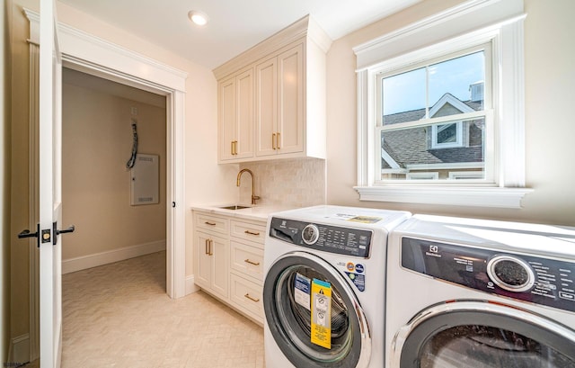 4 Grenada Ln, Ocean City, NJ 08226 - laundry room with cabinet space, baseboards, washing machine and clothes dryer, a sink, and recessed lighting