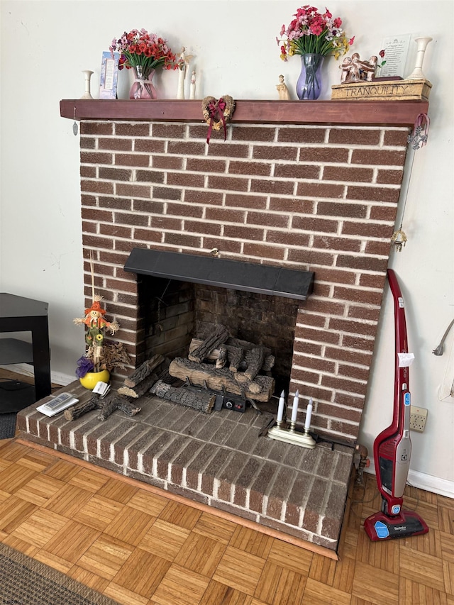 room details with a fireplace and baseboards