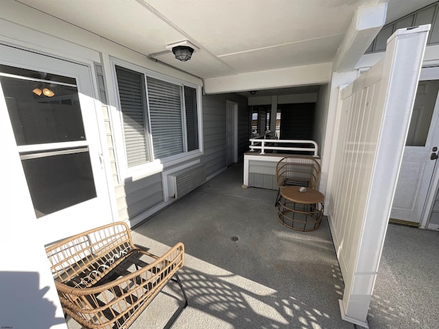 view of patio with radiator heating unit