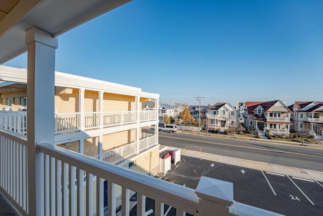 balcony featuring a residential view