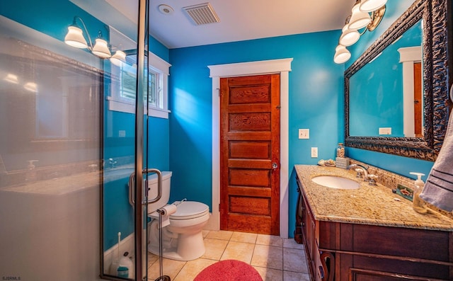 full bath with toilet, vanity, visible vents, tile patterned floors, and a stall shower