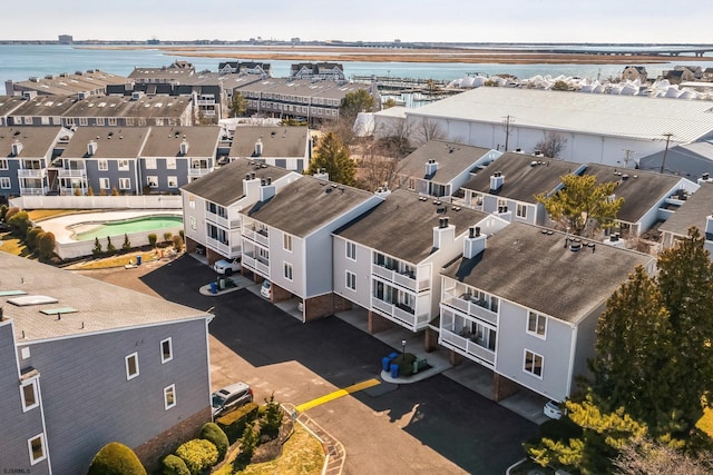 aerial view featuring a water view and a residential view