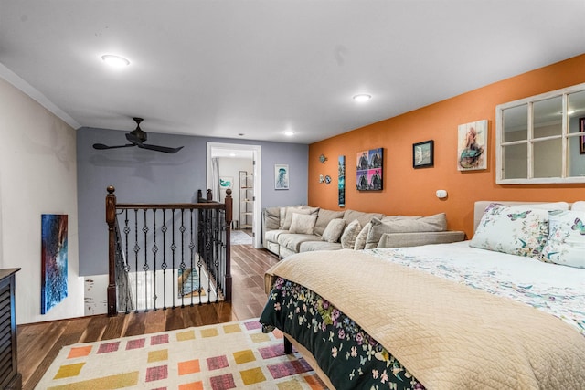 bedroom featuring wood finished floors and recessed lighting