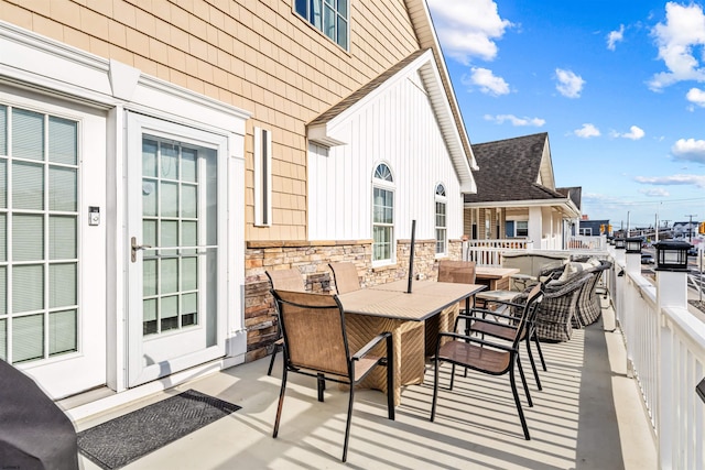 exterior space with outdoor dining area