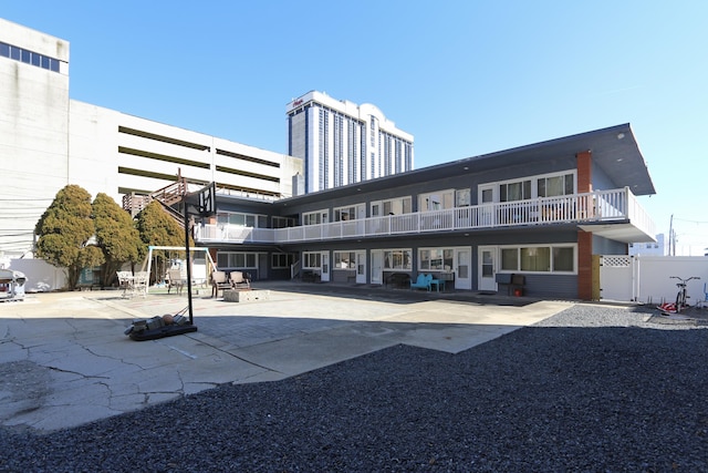 view of building exterior with fence