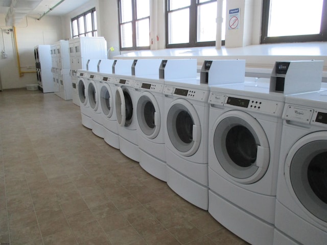 community laundry room with washing machine and dryer