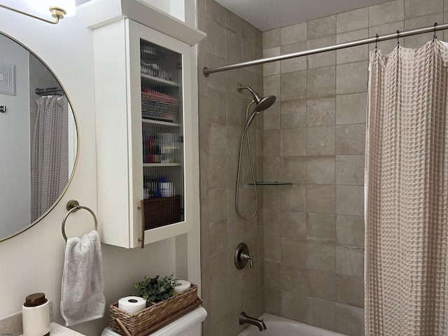 bathroom with shower / bath combination with curtain