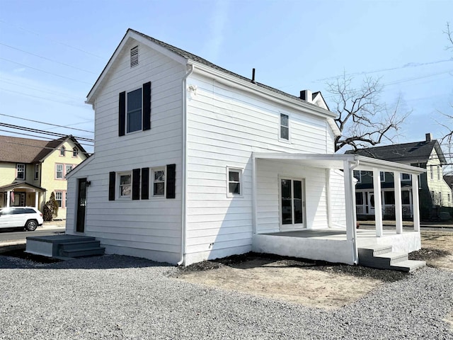 back of house featuring a patio area