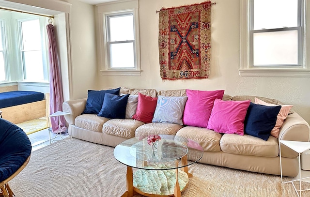 living room featuring a textured wall