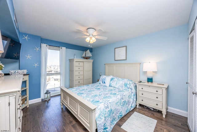 bedroom featuring dark wood-style floors, baseboards, and a ceiling fan