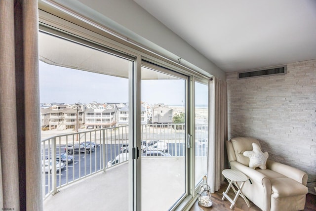 interior space with a residential view and visible vents