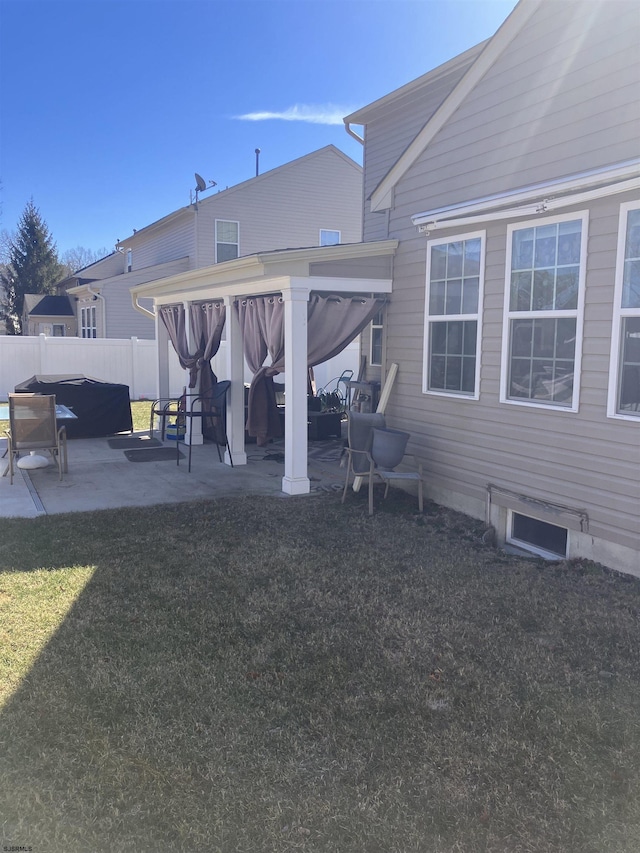 view of yard with a patio and fence