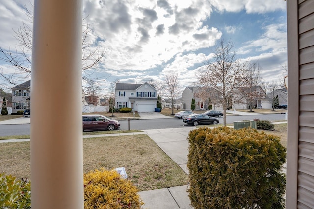 view of yard featuring a residential view