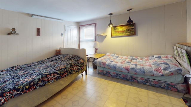 bedroom featuring tile patterned floors