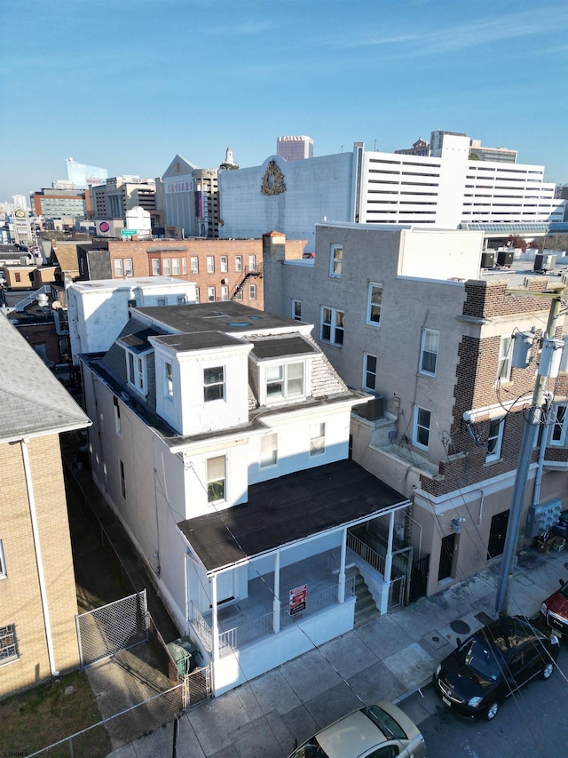 birds eye view of property featuring a city view