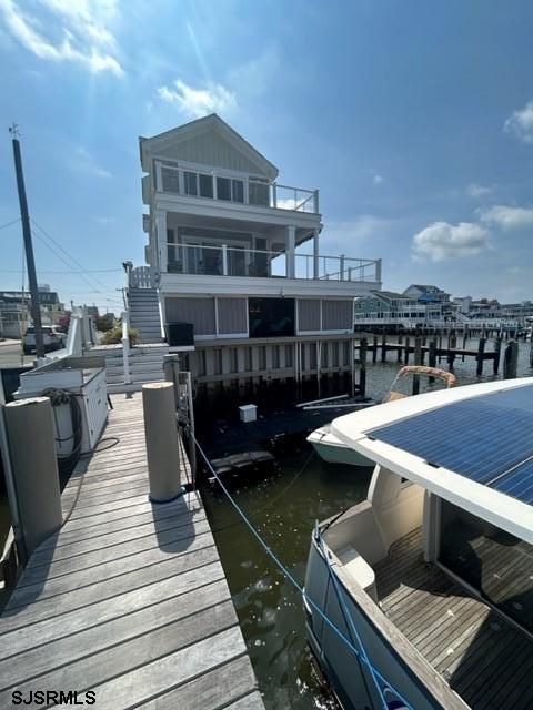 dock area with a water view