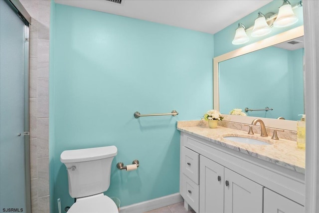 full bathroom featuring visible vents, toilet, an enclosed shower, vanity, and baseboards