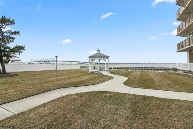 view of home's community featuring a lawn