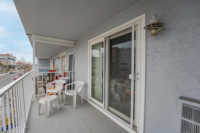 balcony featuring a sunroom