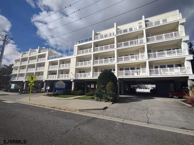 view of building exterior with a carport