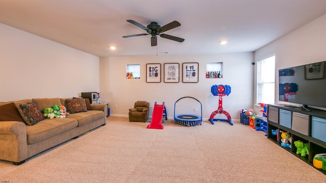 recreation room with ceiling fan, baseboards, carpet flooring, and recessed lighting