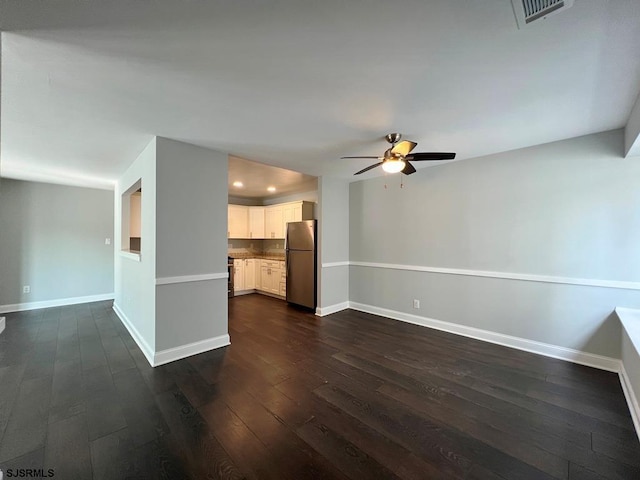 unfurnished living room featuring dark wood-style floors, recessed lighting, visible vents, ceiling fan, and baseboards