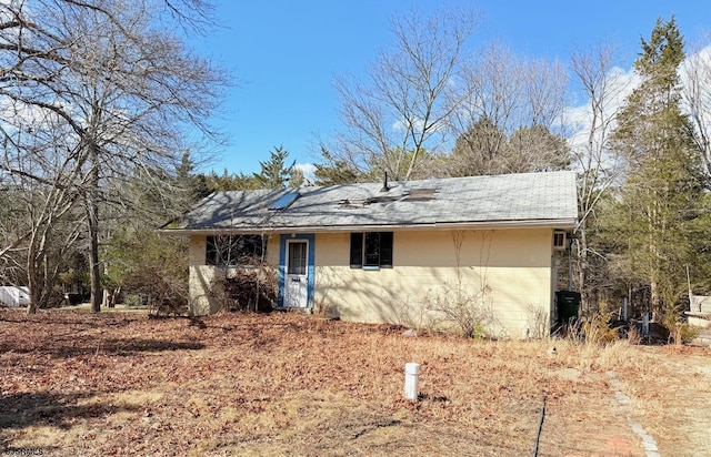 view of front of home featuring concrete block siding