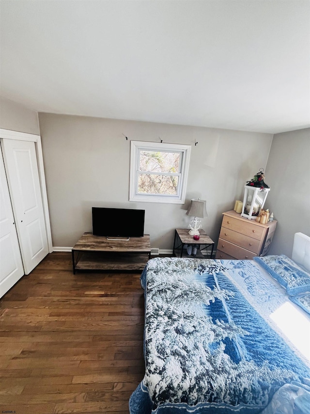 bedroom with wood finished floors