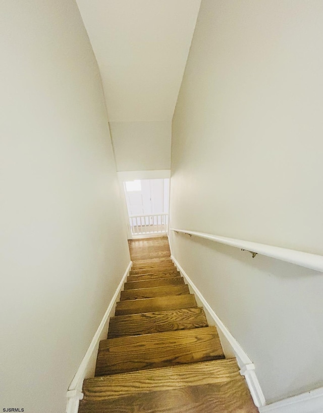 stairway with baseboards