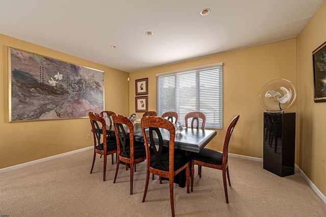 dining area with light carpet, recessed lighting, and baseboards