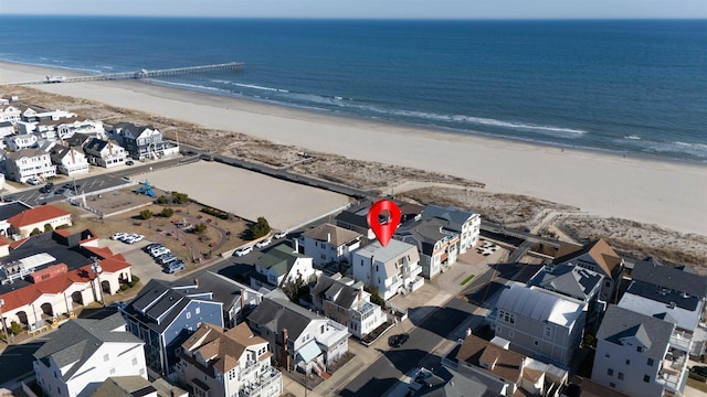 bird's eye view featuring a beach view, a residential view, and a water view